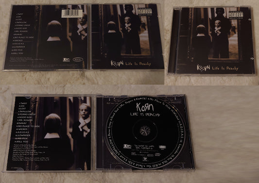 CD albums #2 - Korn, Linkin Park, Metallica, The Offspring, Panic at the Disco, Queens of the Stone Age